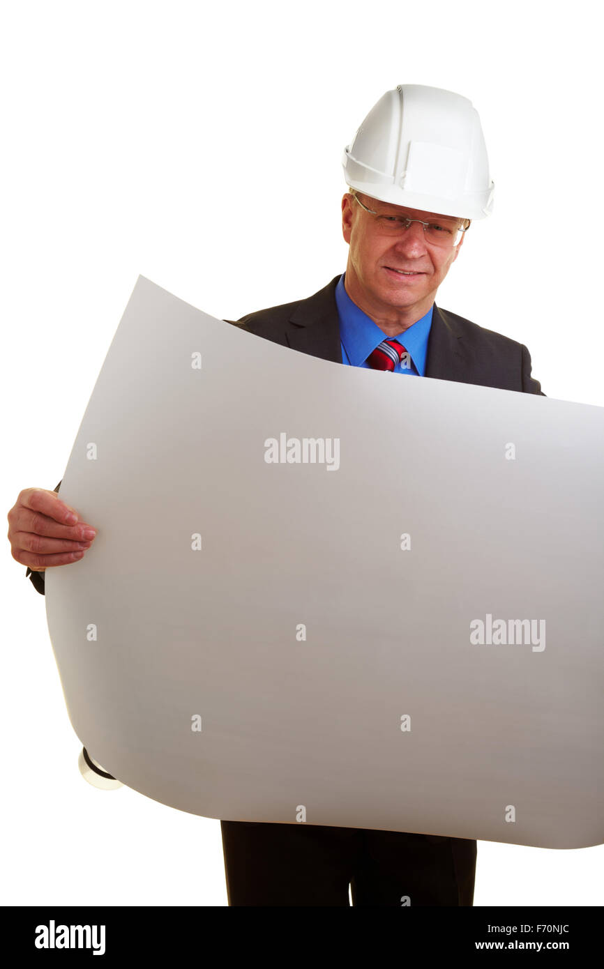 Architect with white helmet holding building plans Stock Photo