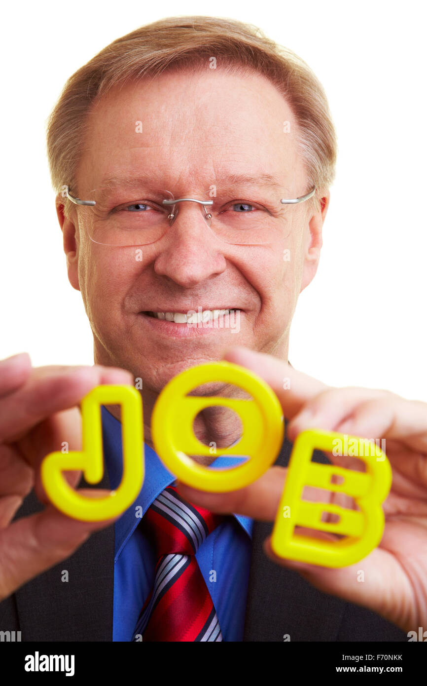 Senior businessman holding letters forming the word JOB Stock Photo