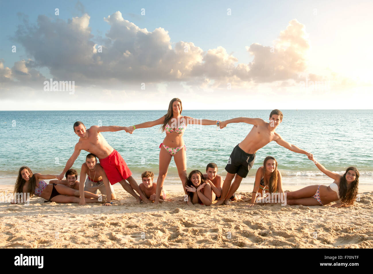 Group of happy teens at the beach Stock Photo