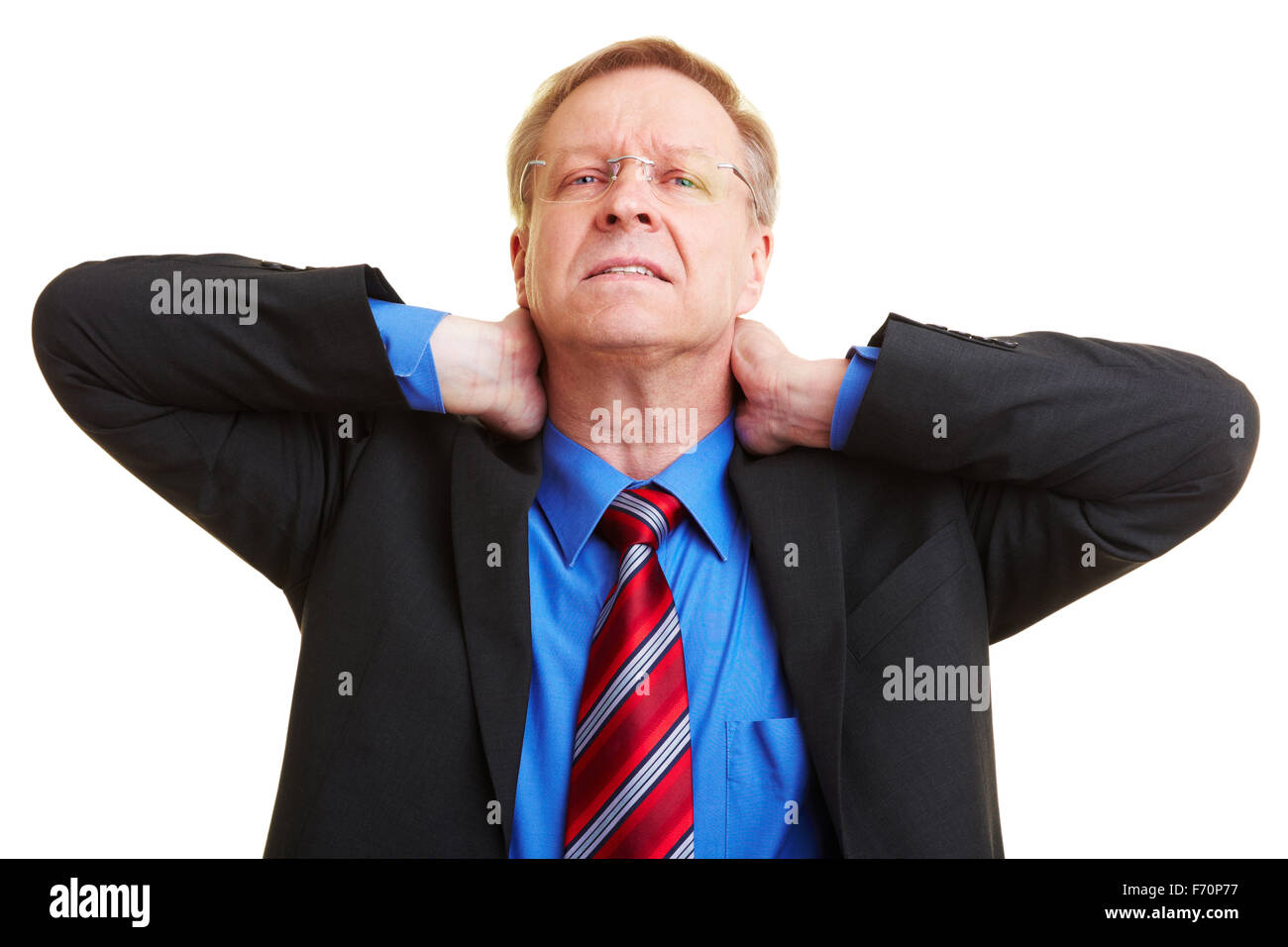 Senior Businessman Holding His Hands To His Aching Neck Stock Photo Alamy