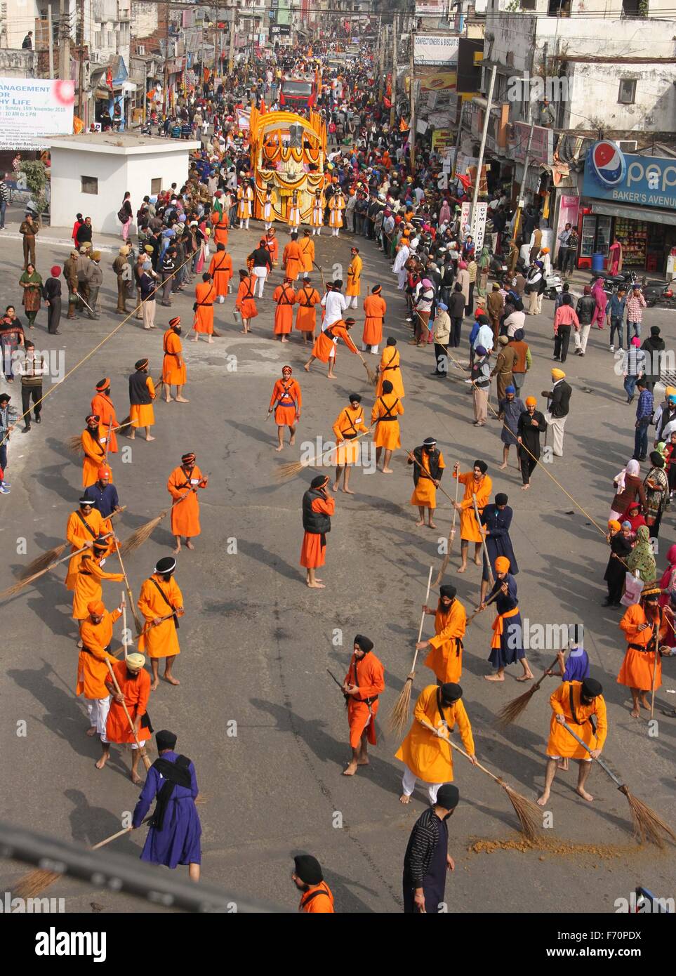 Jammu. 23rd November, 2015. Sikh devotees take out a procession ahead of the 547th birth anniversary of Guru Nanak Dev Ji in Jammu on Monday. Credit:  Raman Raina/Alamy Live News Stock Photo