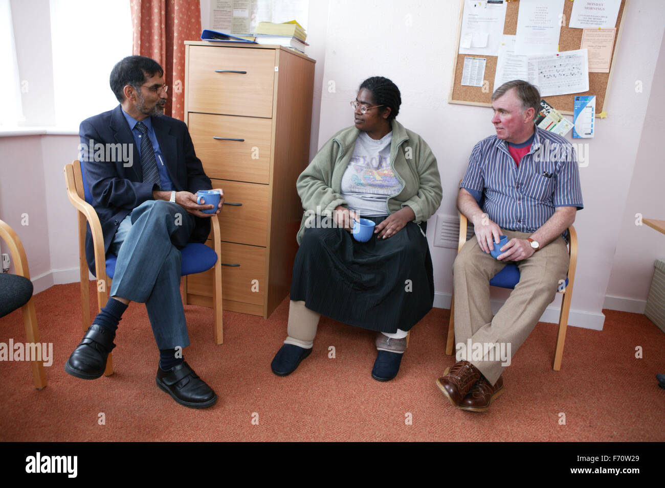 Support worker; development agency and tenant involved in a partnership