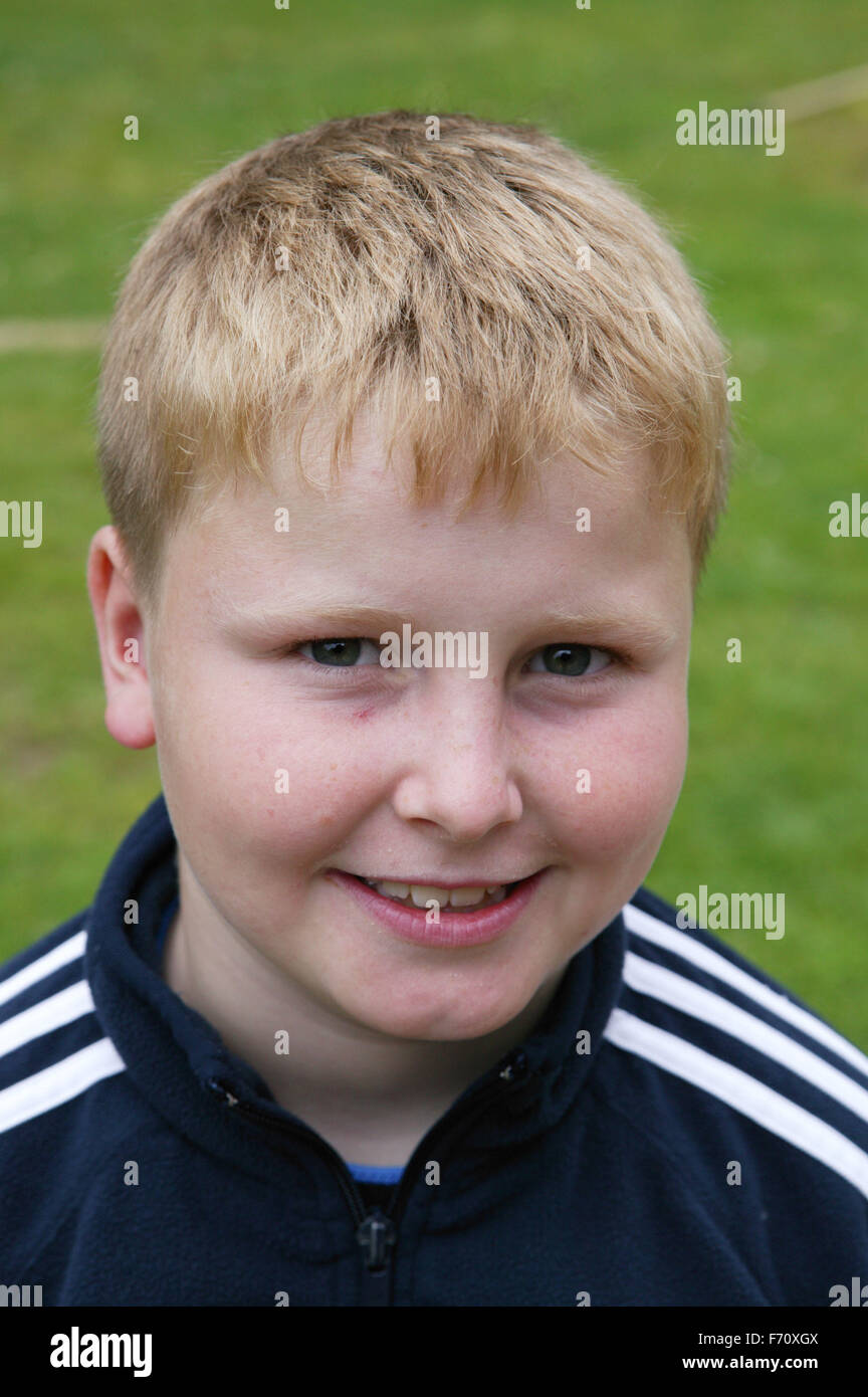 Portrait of a young boy smiling Stock Photo - Alamy
