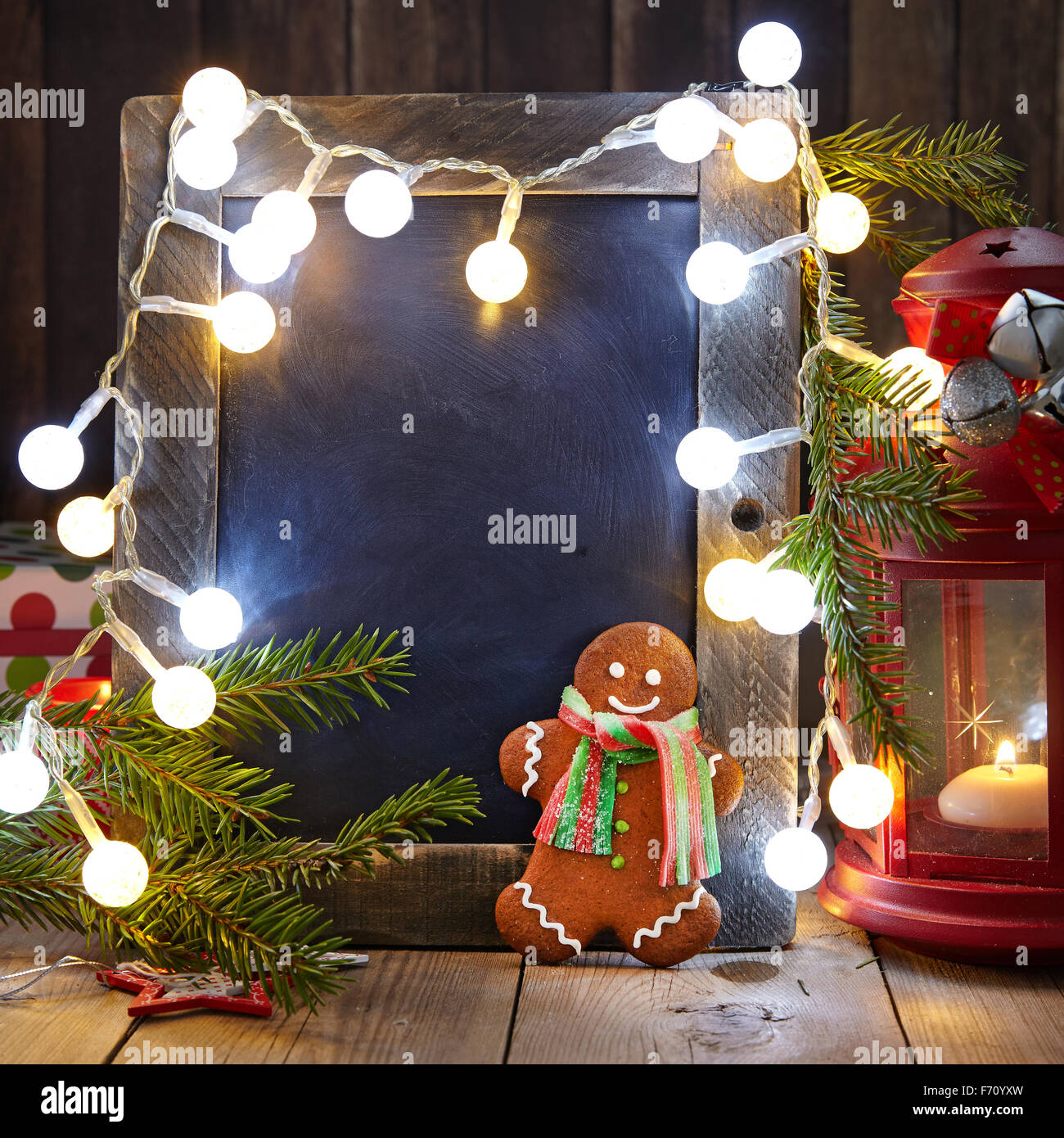 Christmas decoration with chalkboard and gingerbread man Stock Photo