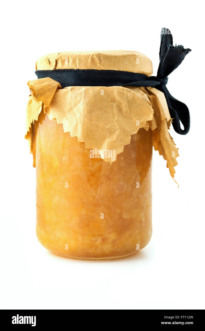 Jar of orange marmalade on a white background Stock Photo