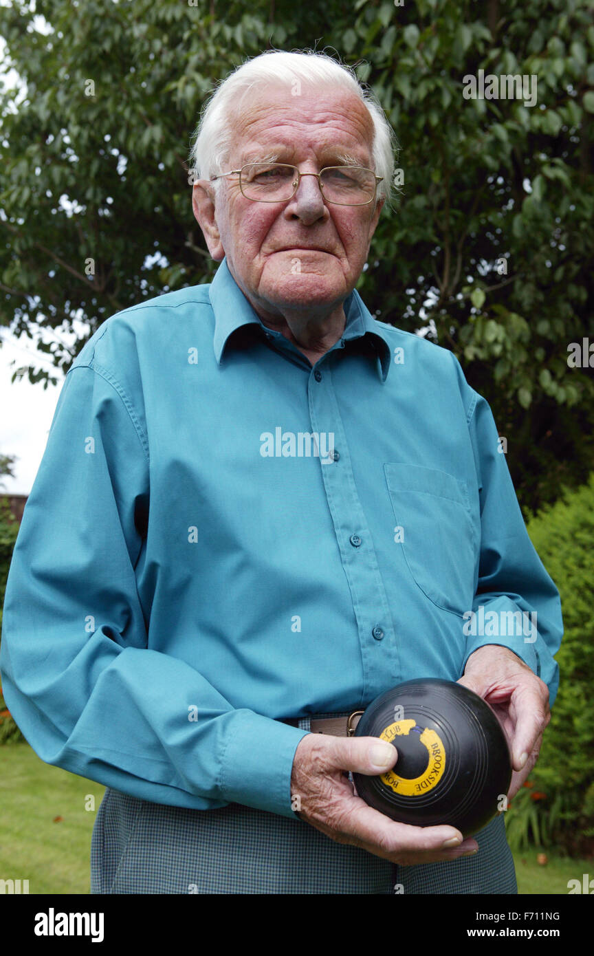 Man holding a bowling ball Stock Photo Alamy