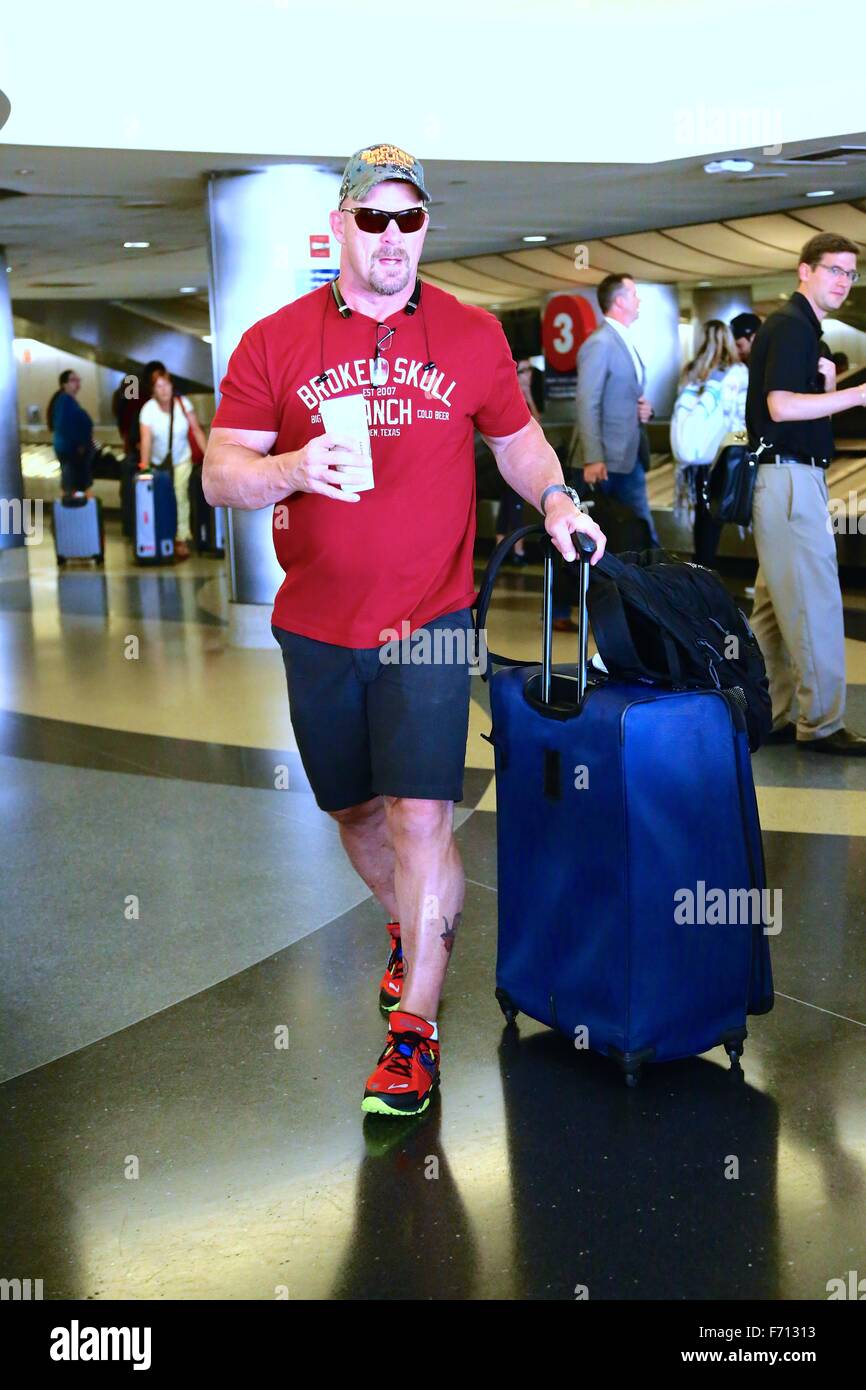 'Stone Cold' Steve Austin departs on a flight from Los Angeles International Airport (LAX)  Featuring: Stone Cold Steve Austin Where: Los Angeles, California, United States When: 20 Oct 2015 Stock Photo