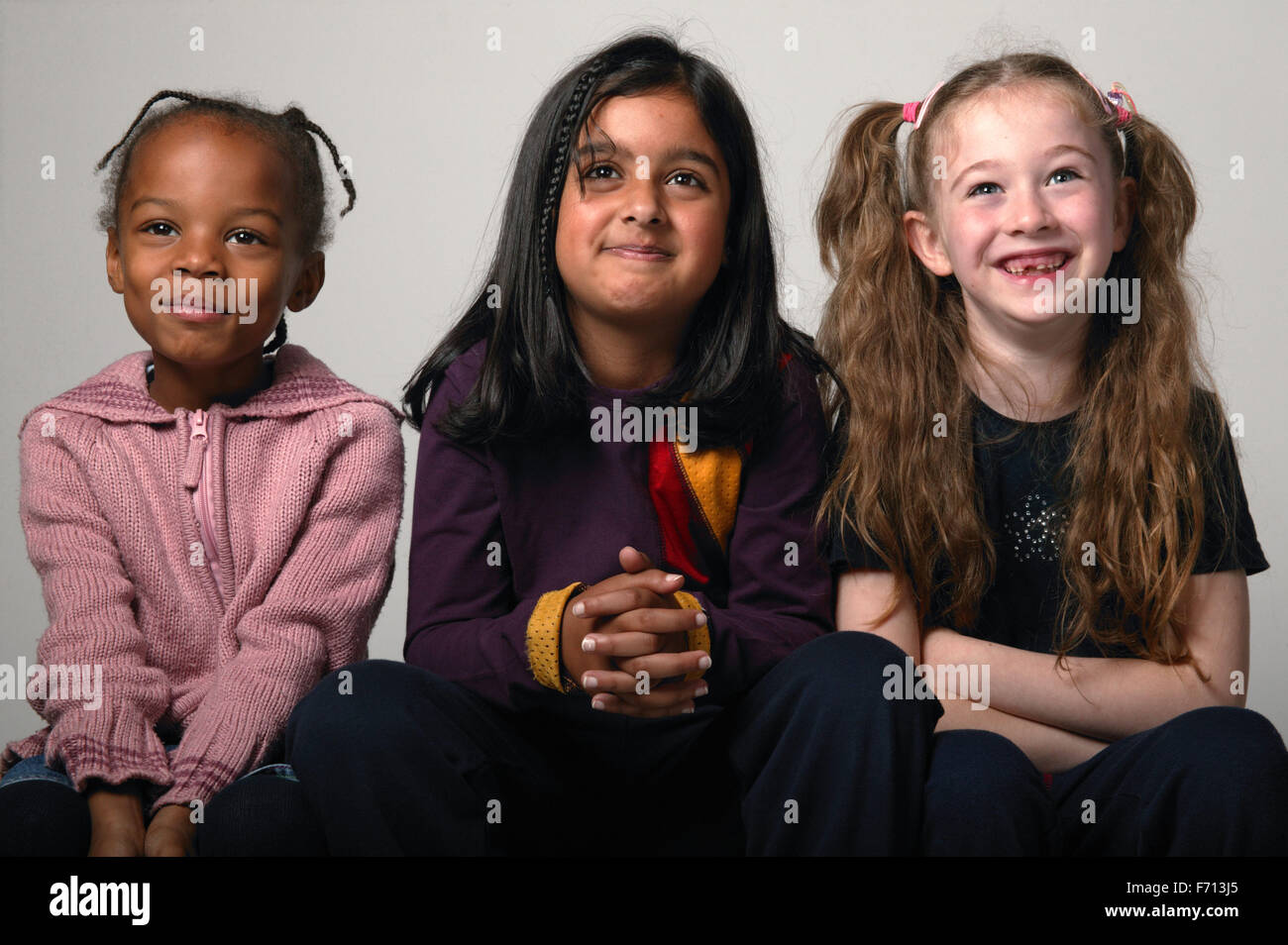 Group portrait of three young girls Stock Photo - Alamy