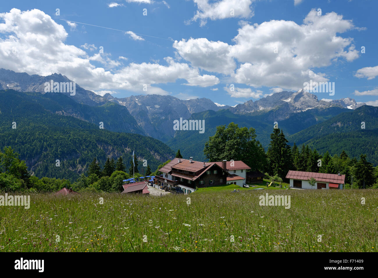 Berggasthaus Eckbauer, guesthouse, Wetterstein mountain range with Alpspitze and Zugspitze behind Stock Photo