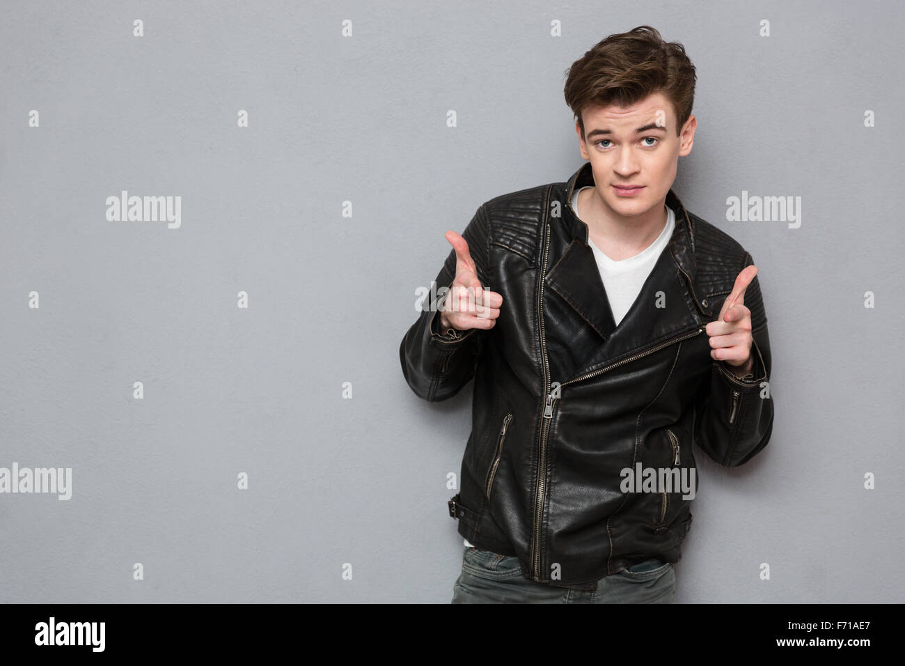 Muscular man in leather jacket hi-res stock photography and images - Alamy