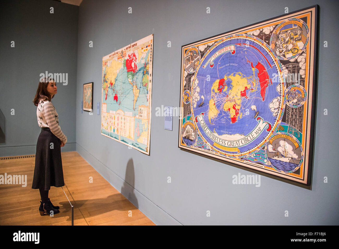 London, UK. 23rd November, 2015. The Mapping and Marking Room includes maps and 'adapted' flags from around the Empire - Artist and Empire - a new Tate Britain exhibition about Imperial visual culture, examining the people who helped to create or confront the British Empire in their art. It features over 200 paintings, drawings, photographs, sculptures and artefacts from across the British Isles, North America, the Caribbean, the Pacific, Asia and Africa. Credit:  Guy Bell/Alamy Live News Stock Photo