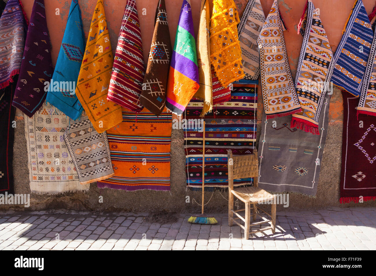 Colorful berber rugs for sale at Marrakesh souk Stock Photo