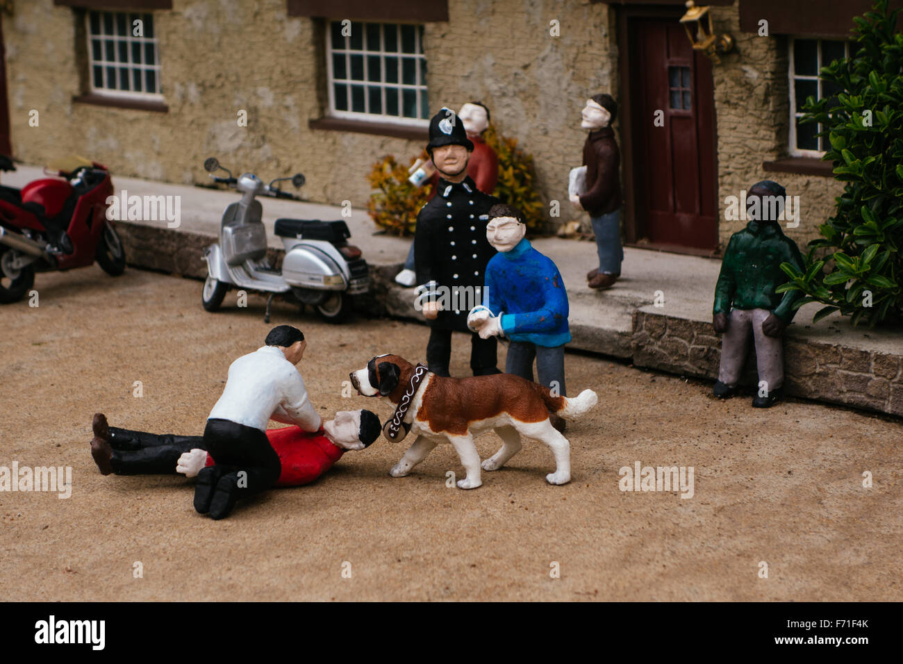 Miniature figures UK police criminal Stock Photo