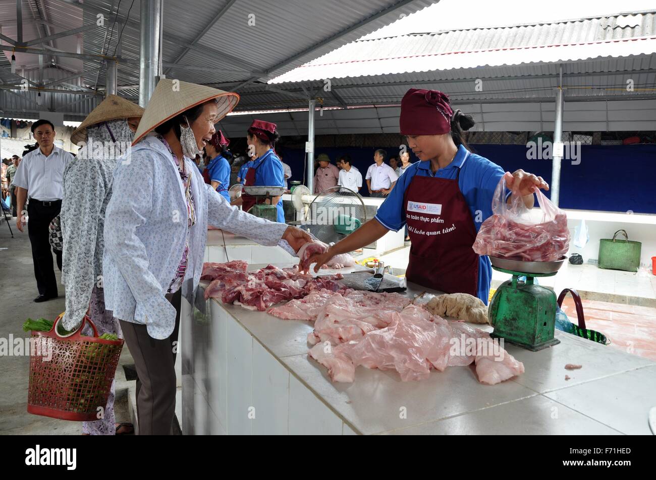 Vietnamese food venders display meat for sale at the Hoa Mac Market