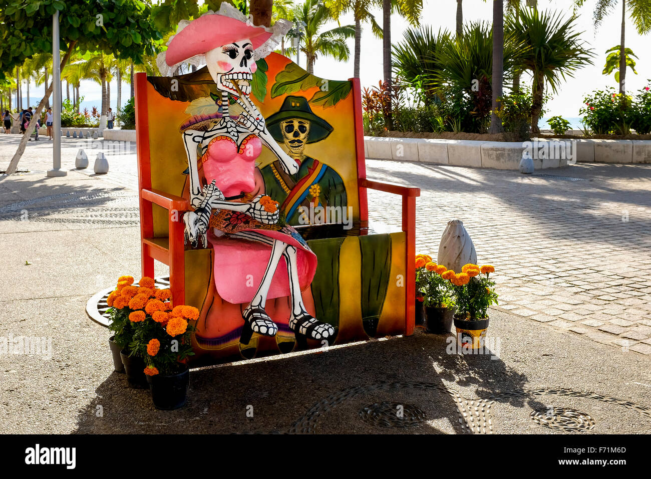 Wooden bench seat decorated and painted to celebrate the festival of death and Halloween, Puerto Vallarta, Mexico Stock Photo