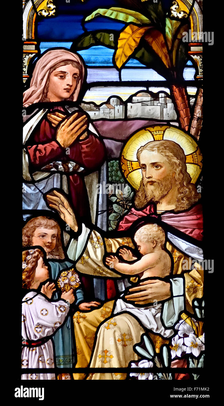 London, England, UK. Guild Church of St Dunstan in the West, Fleet Street. Stained Glass Window: Jesus Christ with Children Stock Photo