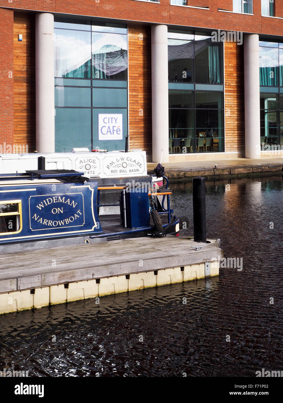 Narrowboats and Modern Architecture at Granary Wharf Leeds West Yorkshire England Stock Photo