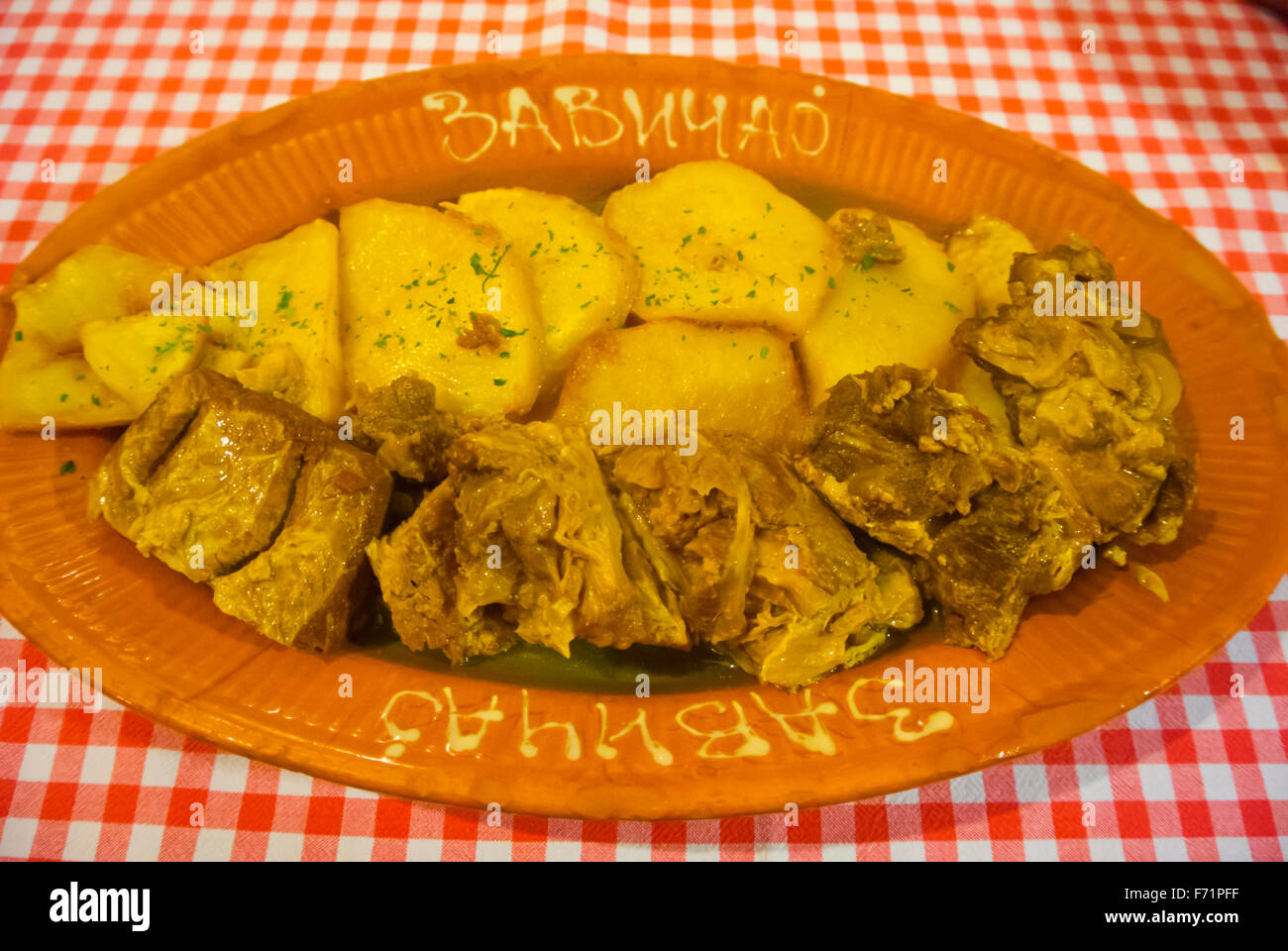 Roast veal with potatoes, Zavicaj, a traditional Serbian restaurant, Belgrade, Serbia Stock Photo