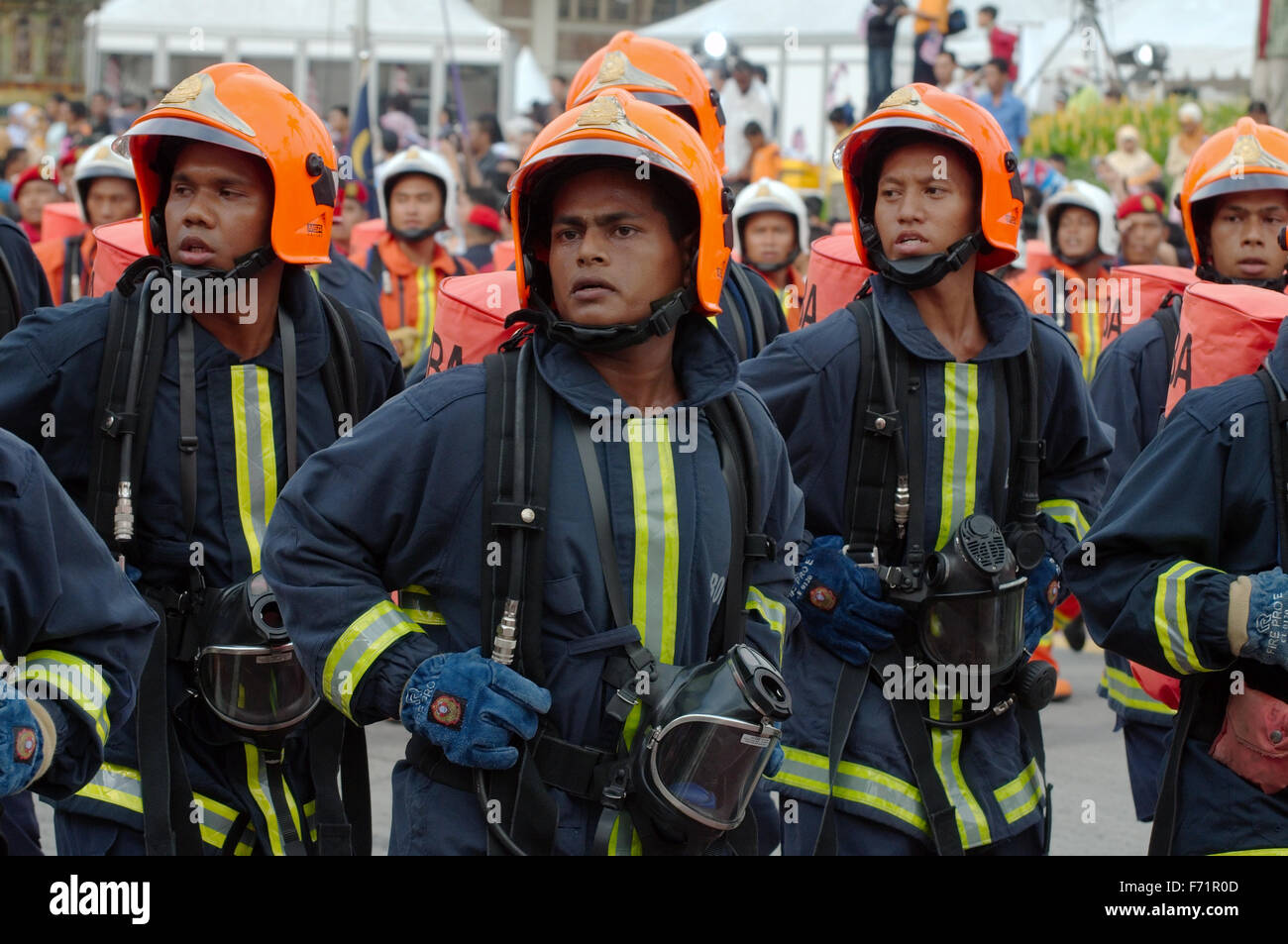formation of military firemen marching in parade 16 September 