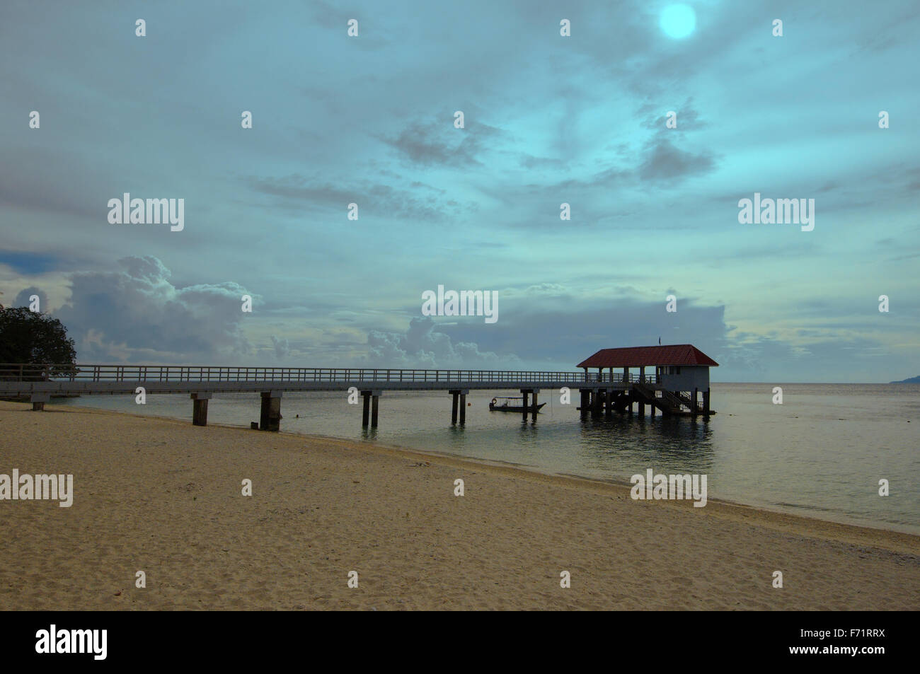 pier on a sandy beach,  Redang Island Stock Photo