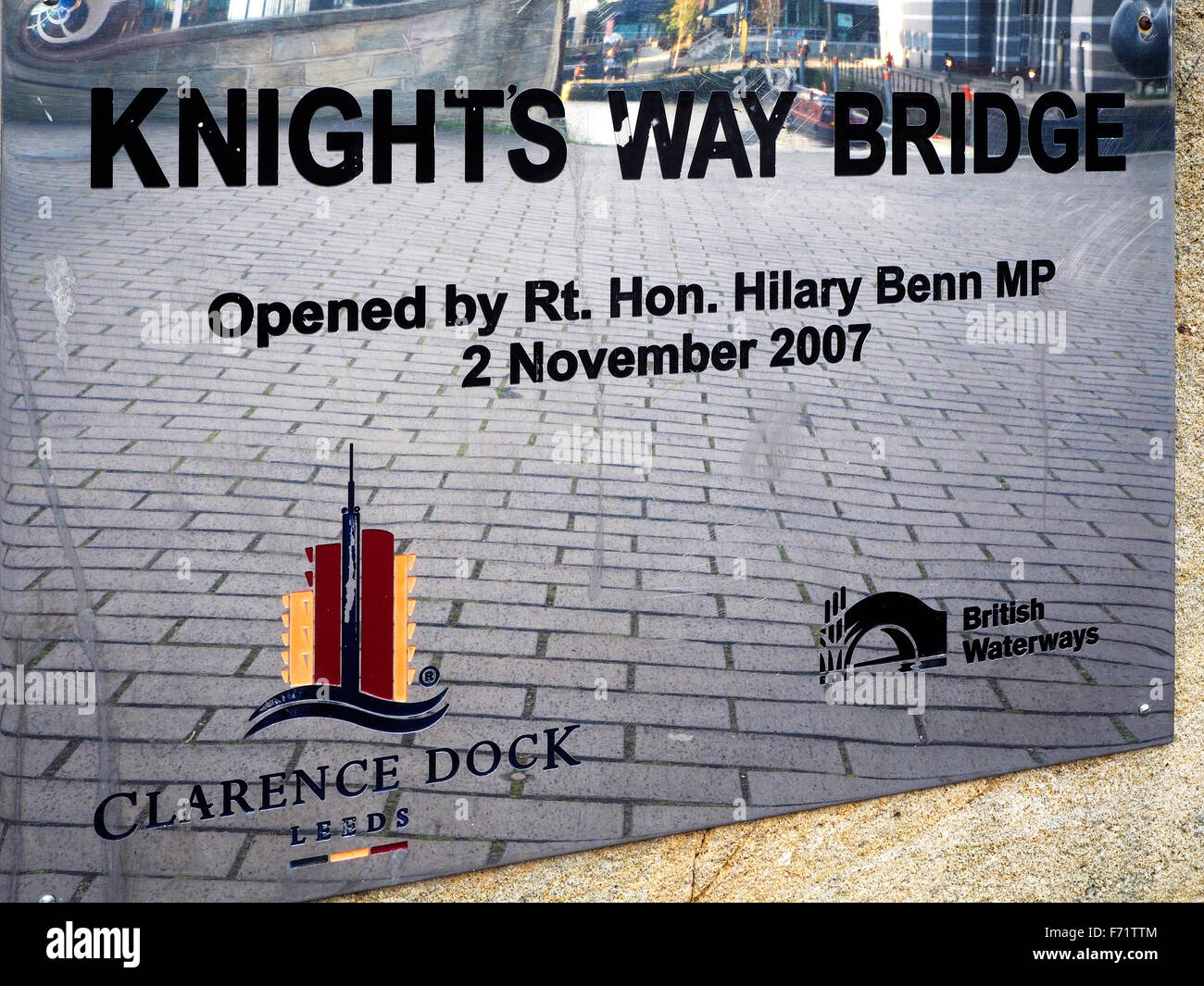 Plaque Commemorating the Opening of Knights Way Bridge by Hilary Benn MP at Clarence Dock Leeds West Yorkshire England Stock Photo