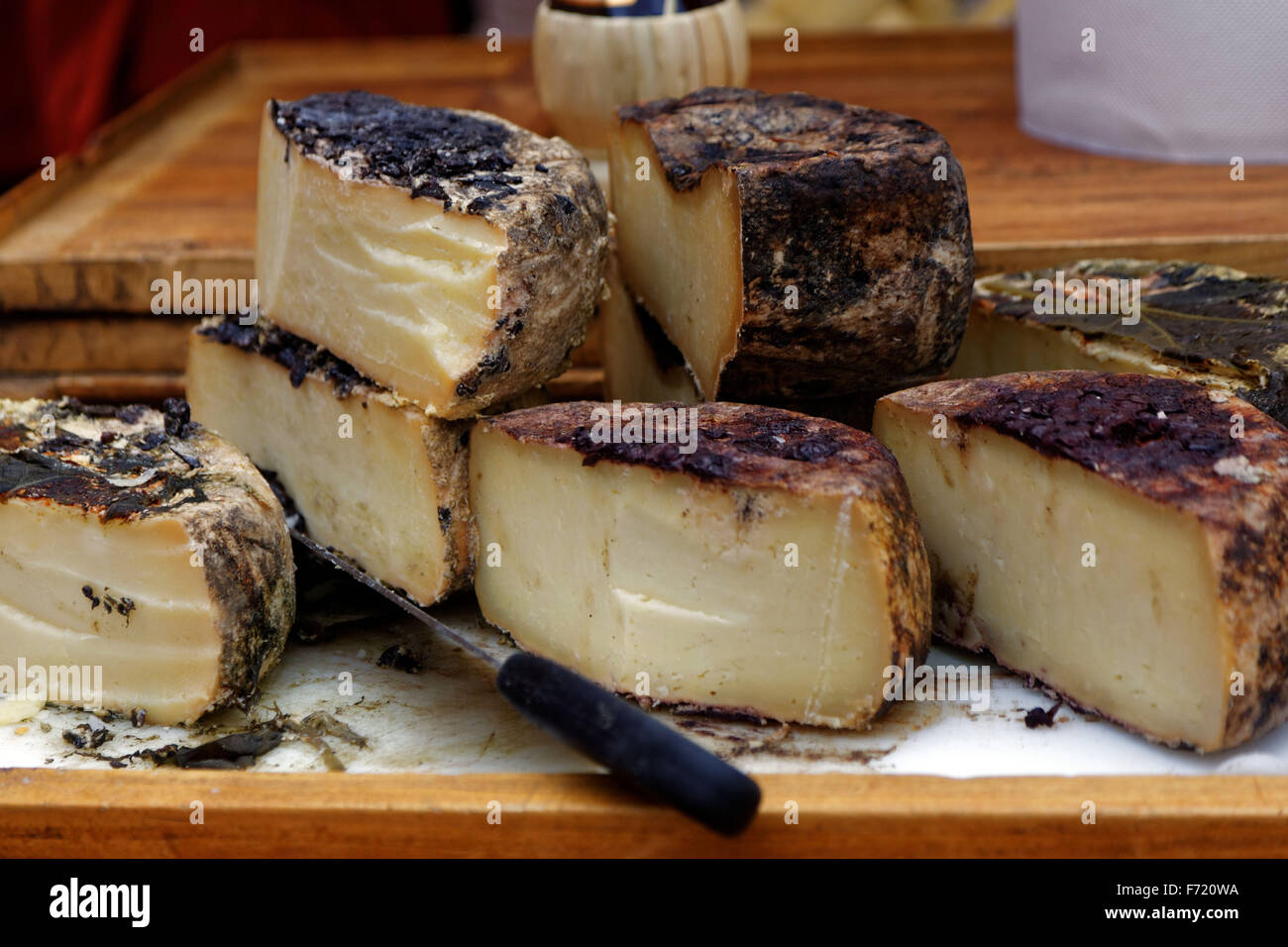 A selection of  Tuscan Pecorino cheeses on display at a market in Italy. Stock Photo