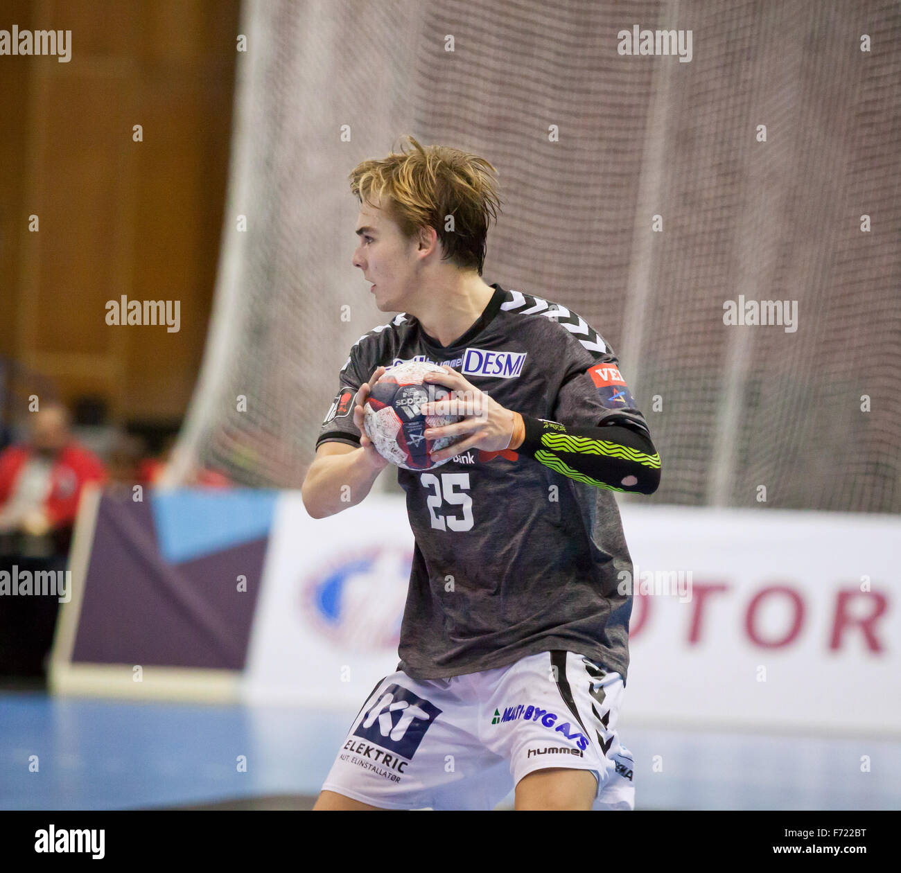 KYIV, UKRAINE - OCTOBER 18, 2014: Christian Jensen of Aalborg controls a ball during European Handball Champions League game against Motor Stock Photo