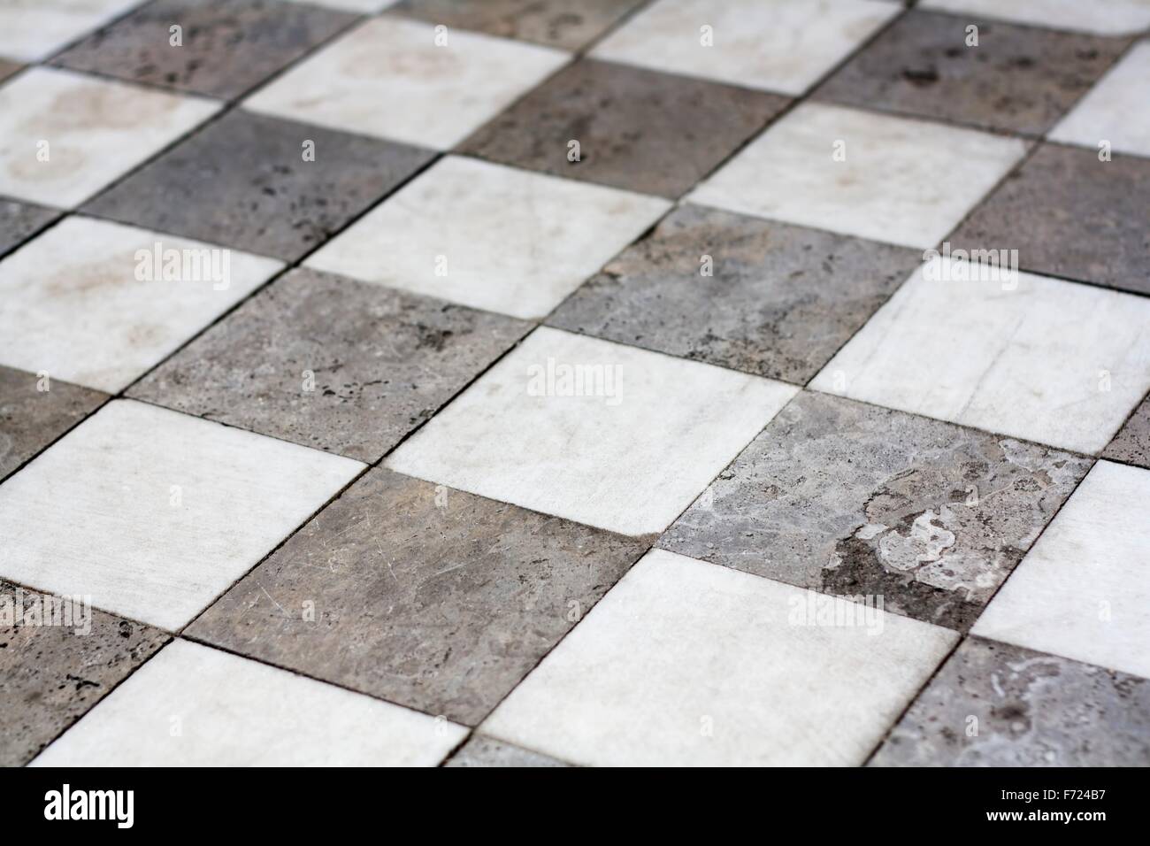 Stone tiled floor, chessboard like pattern Stock Photo