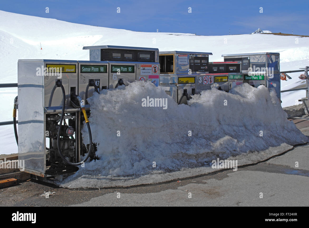 Fuel pumps at a petrol station in the mountains in Andorra where a pile