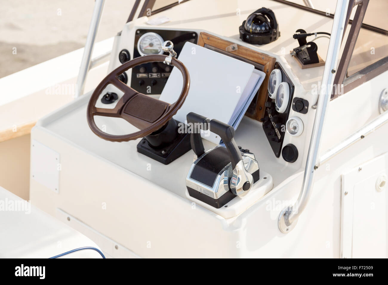 Instrument panel and steering wheel of a motor boat Stock Photo - Alamy