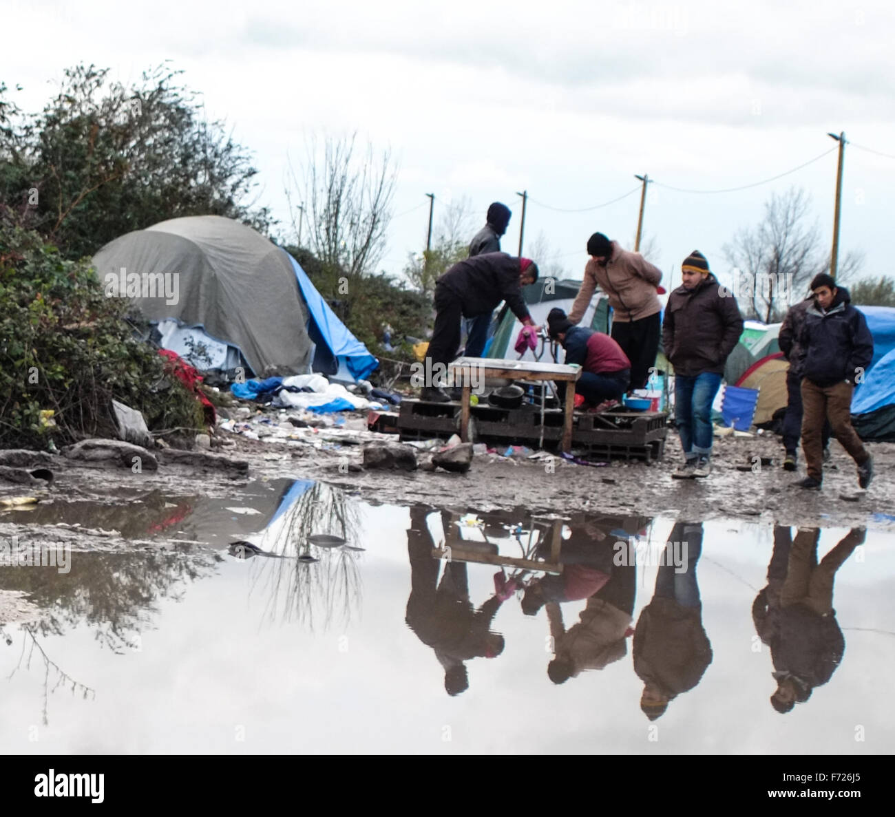 Calais, France. 23rd Nov, 2015. Refugees living in the calais jungle Face a harsh winter as they