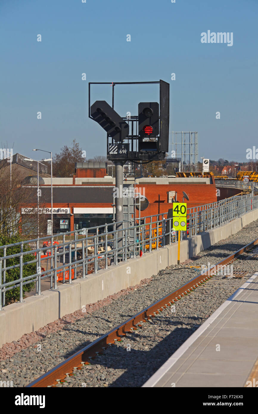 Signal T1698 displaying a red stop aspect,the signal also has a number one junction indicator and theatre box below the aspect Stock Photo