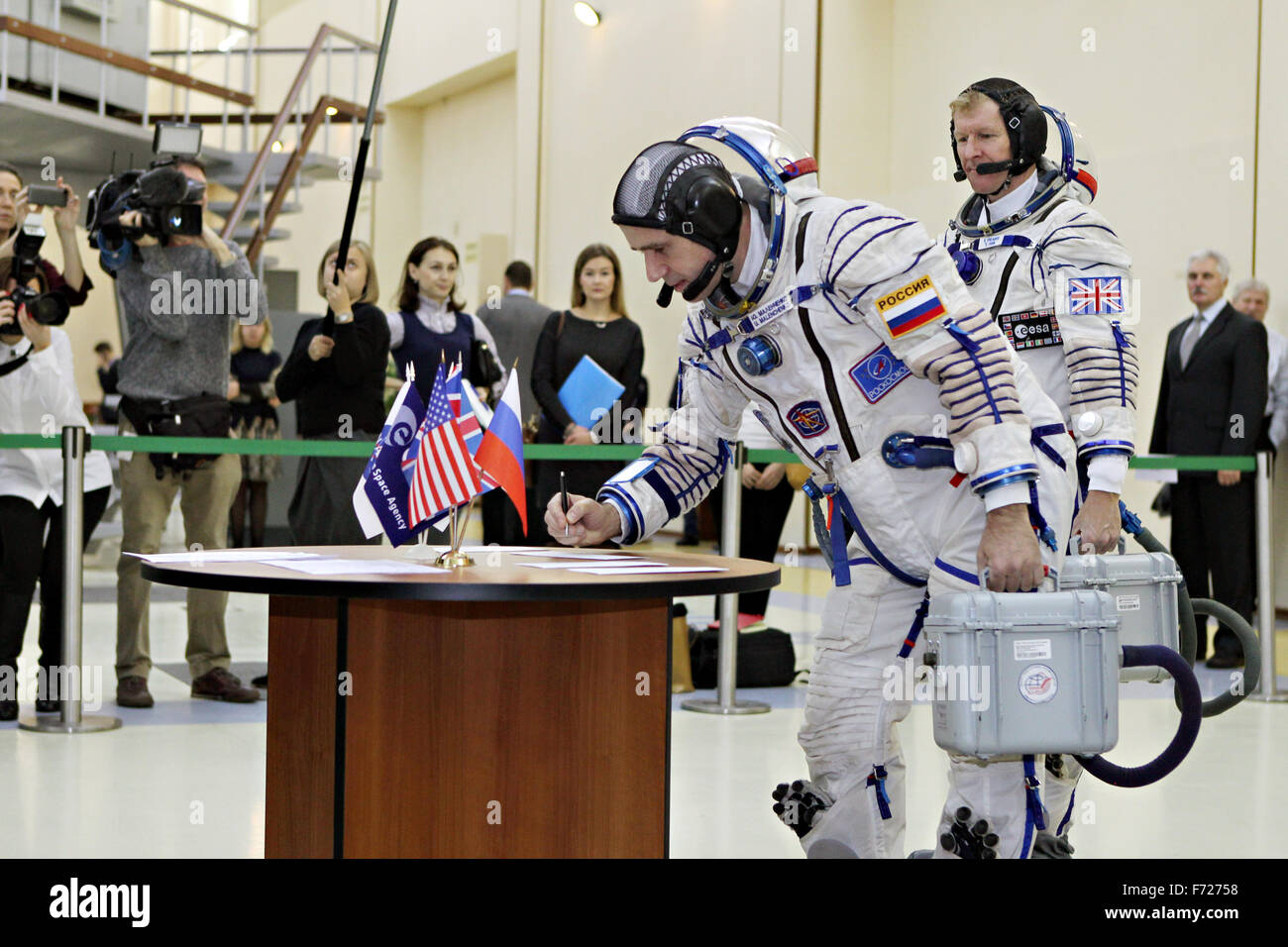 International Space Station Expedition 46 crew member Yuri Malenchenko of the Russian Federal Space Agency signs in for his qualification exam at the Gagarin Space Center November 20, 2015 in Star City, Russia. Expedition 46 crew members Yuri Malenchenko, Tim Peake and Tim Kopra launch December 15 for a six-month mission on the International Space Station. Stock Photo