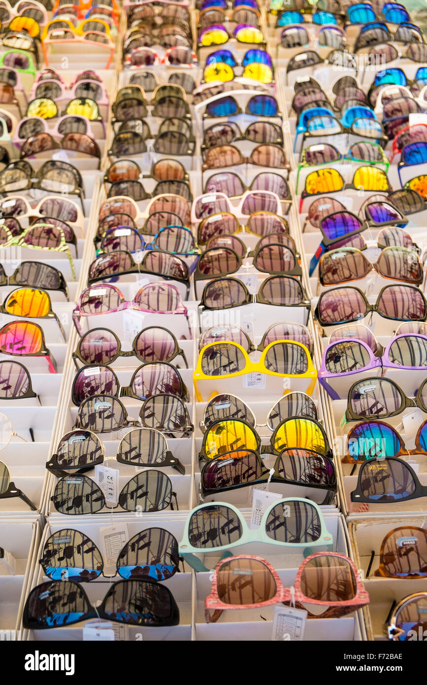 Retail display of various styles of sunglasses Stock Photo