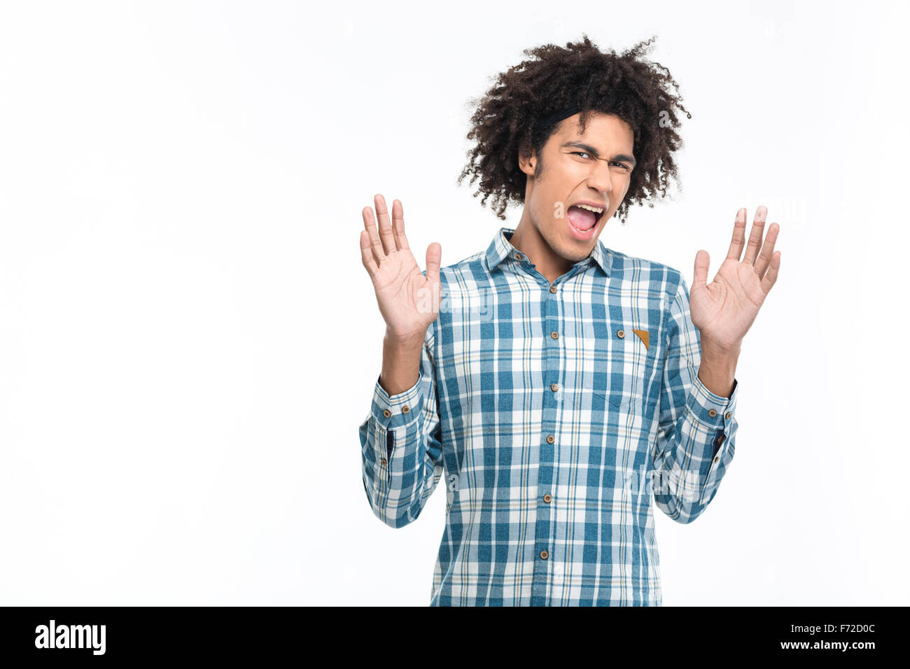 Portrait of a young afro american man showing stop gesture with palms isolated on a white background Stock Photo