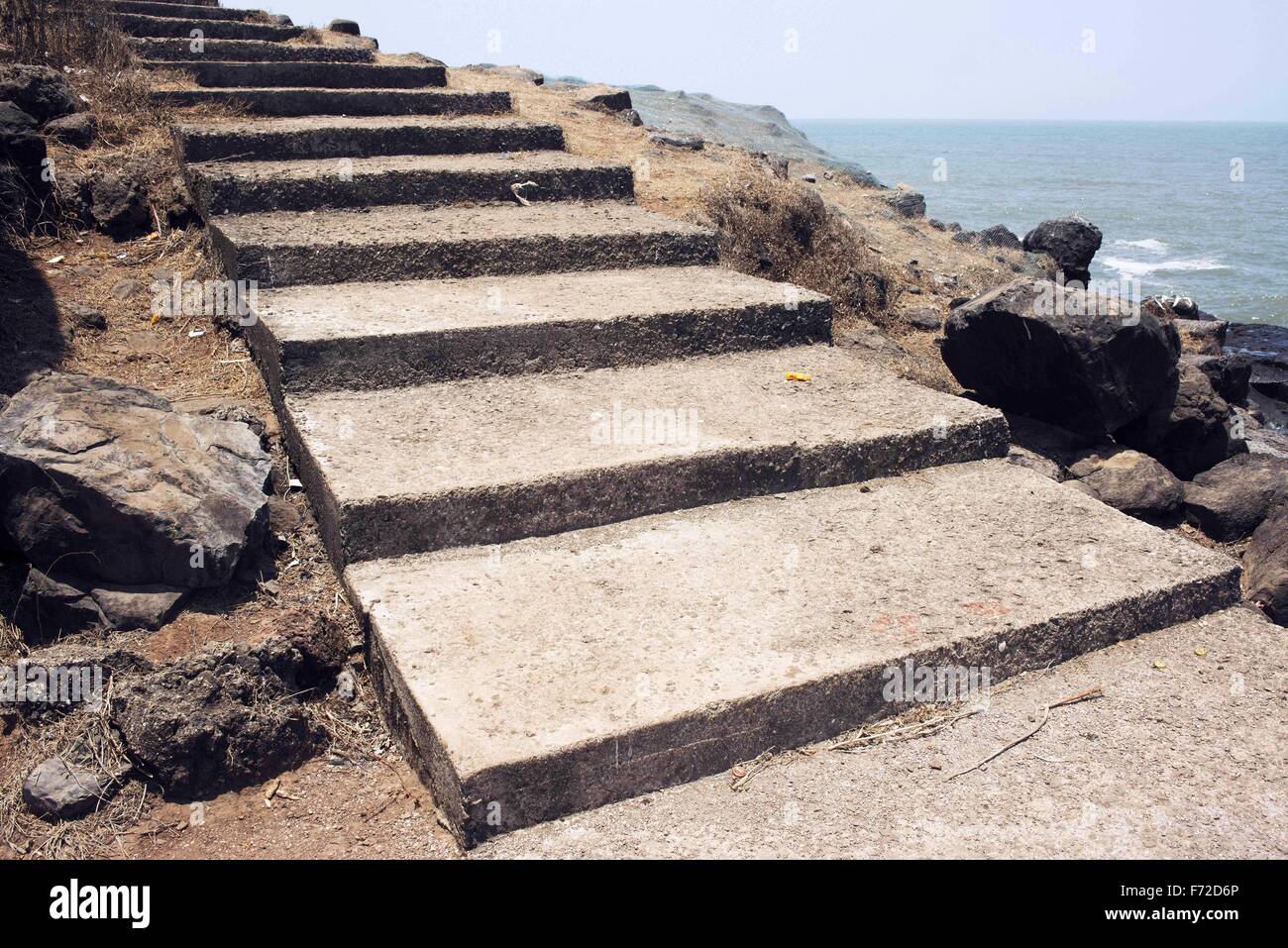 Concrete steps at harnai beach, ratnagiri, maharashtra, india, asia Stock Photo
