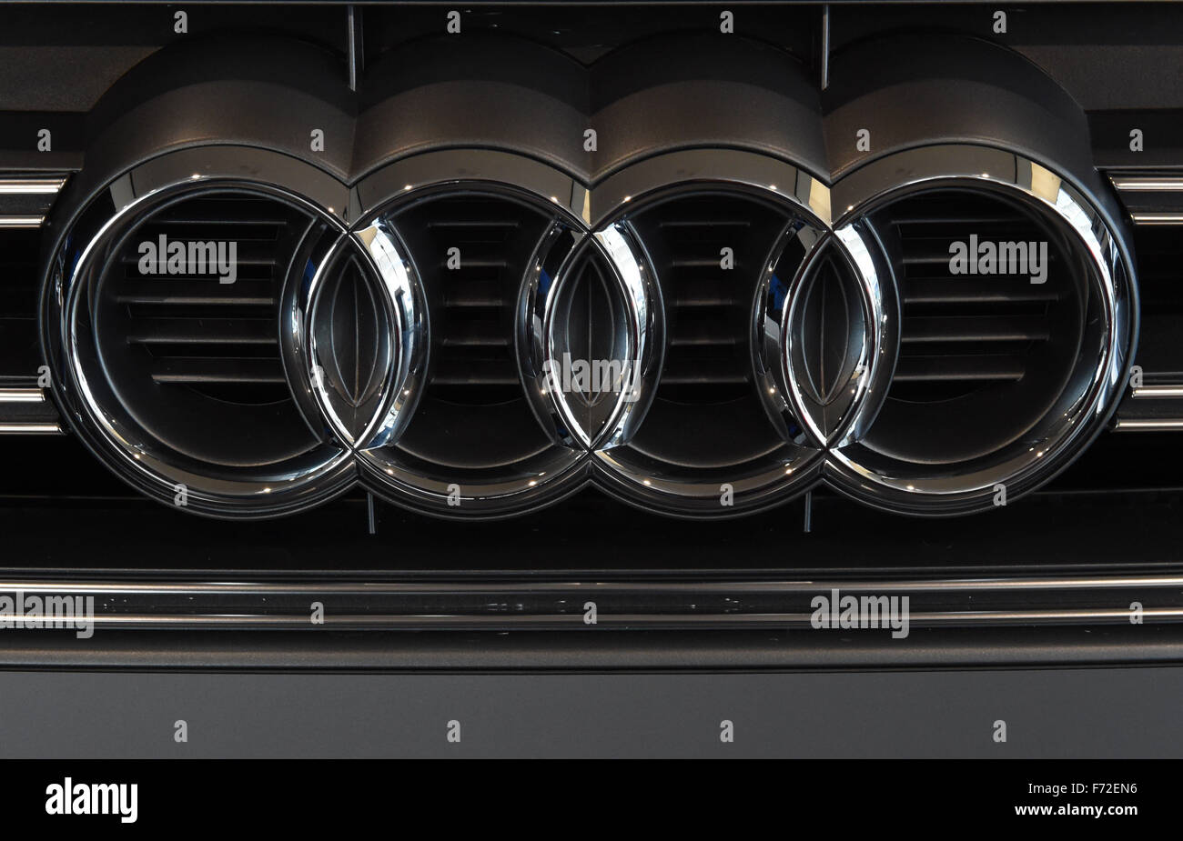 The Audi logo of four interlocking rings on the grille of an Audi S1, at the Audi Forum Munich Airport, Munich, Germany, 8 March 2015. Photo: Felix Hoerhager/dpa - NO WIRE SERVICE - Stock Photo
