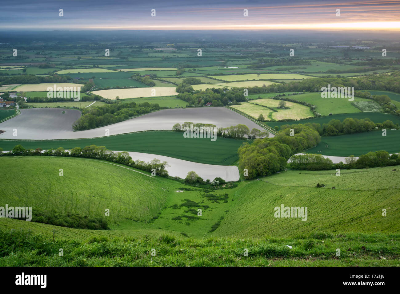 Sunrise over rolling English countryside landscape in Spring Stock Photo