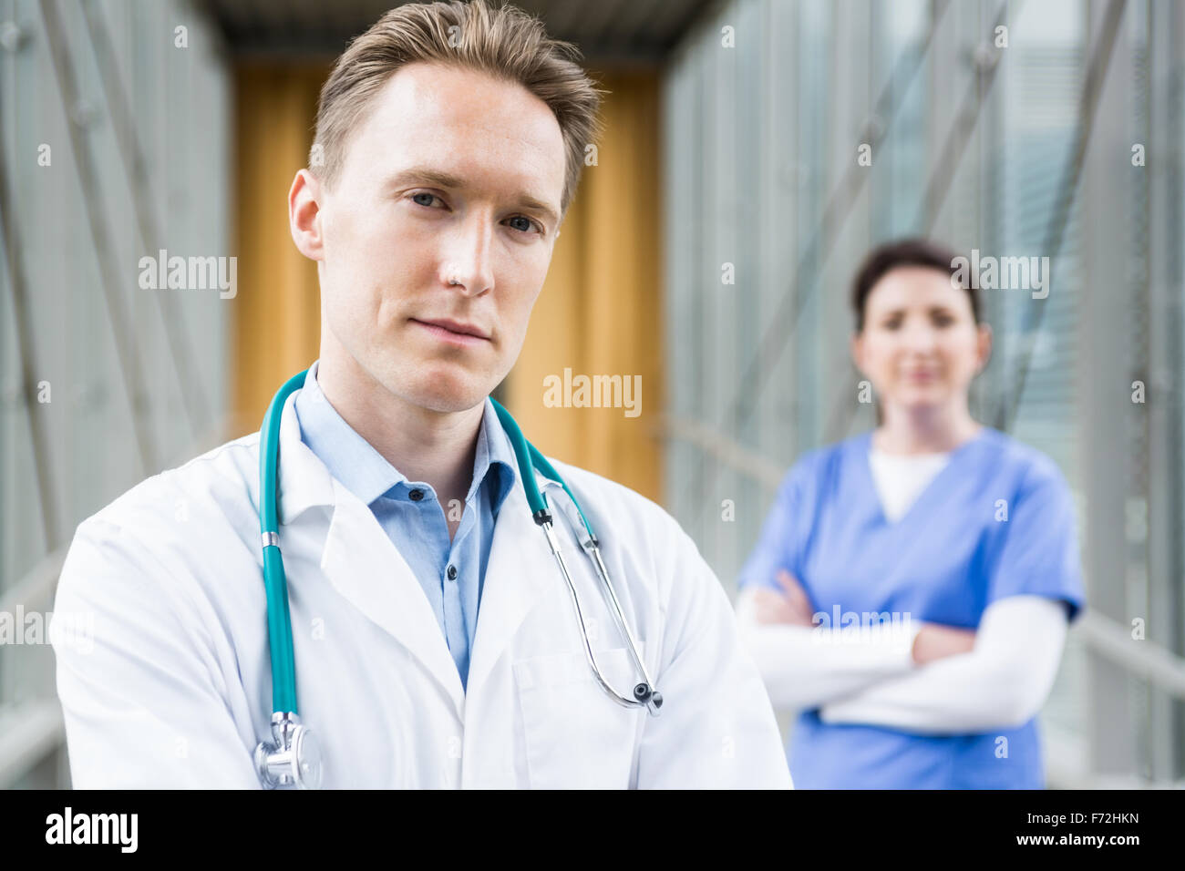 Medical team smiling at camera together Stock Photo Alamy