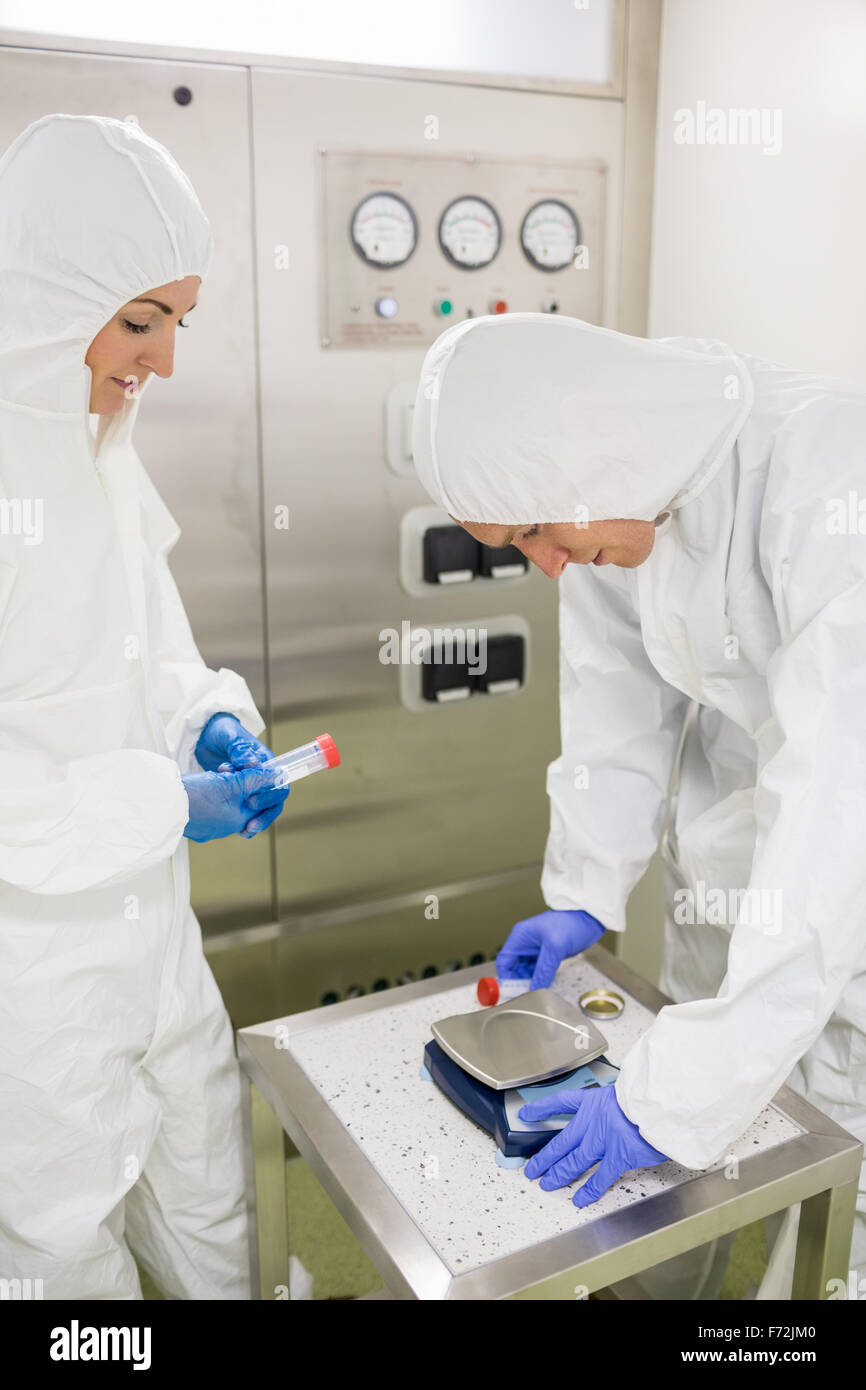 Scientists working with hazardous material Stock Photo