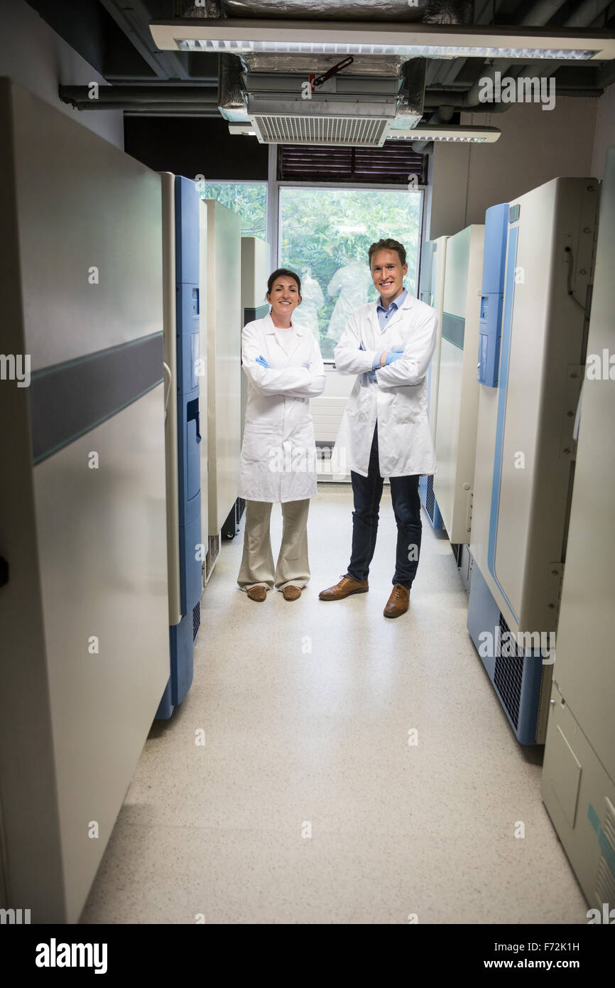 Two scientists smiling at camera Stock Photo