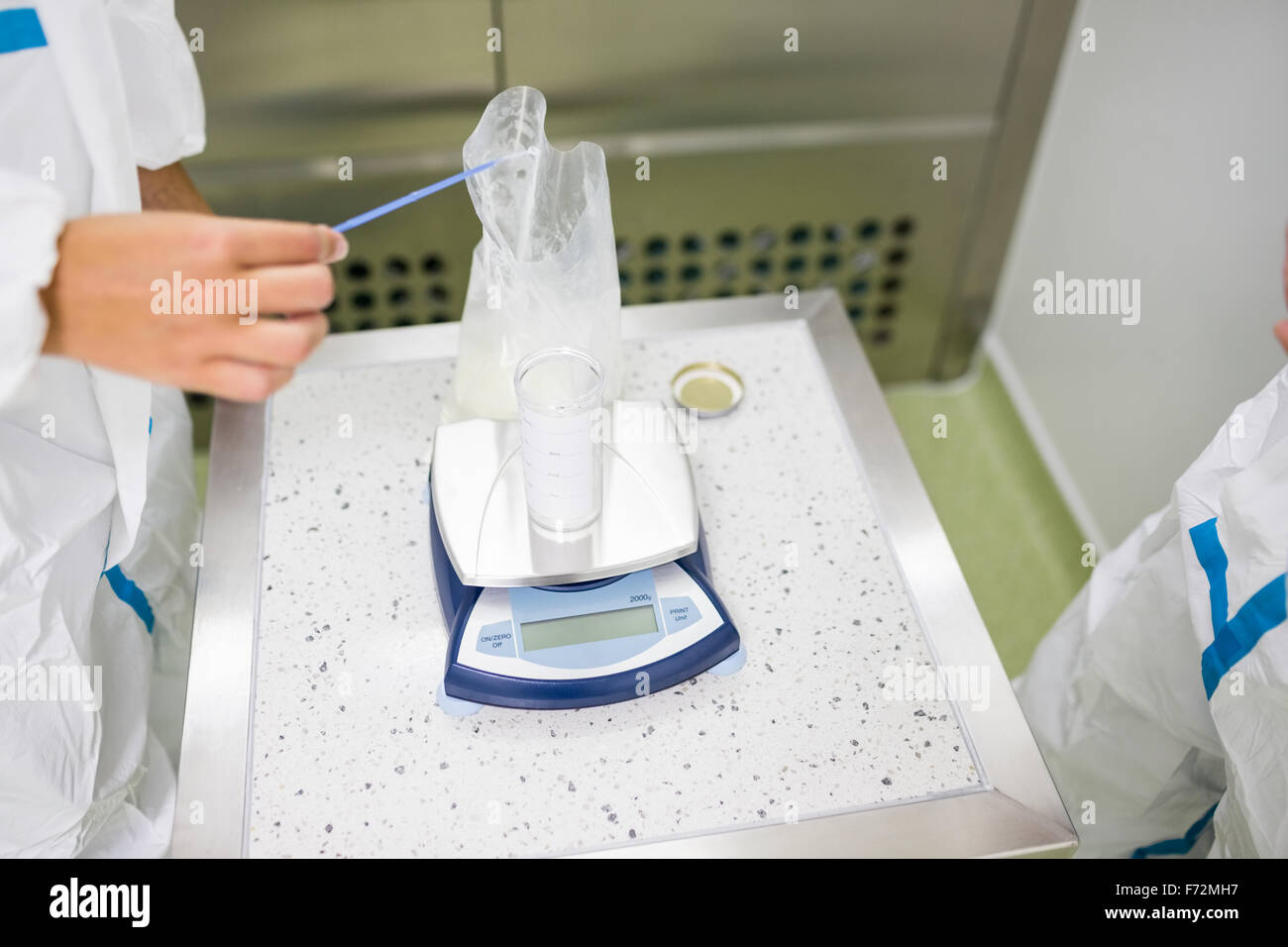 Scientists working with hazardous material Stock Photo