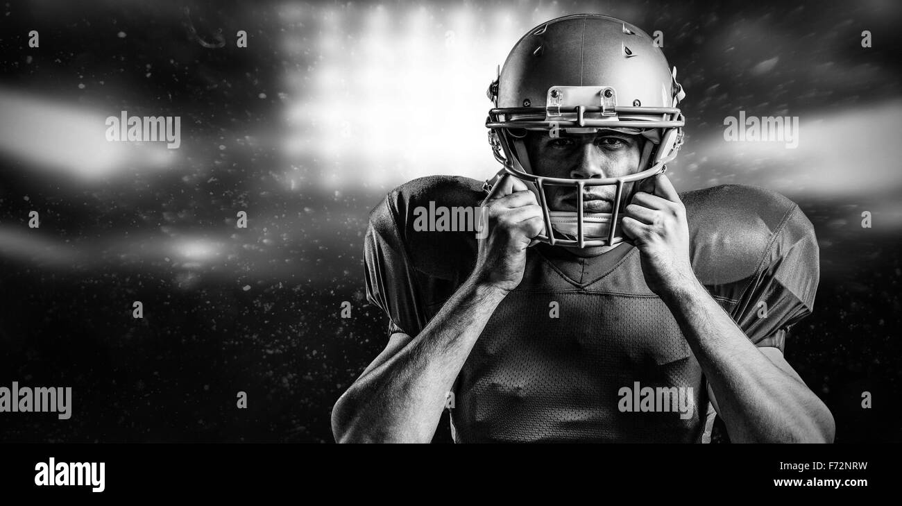 Premium Photo  American football player in dark uniform with the