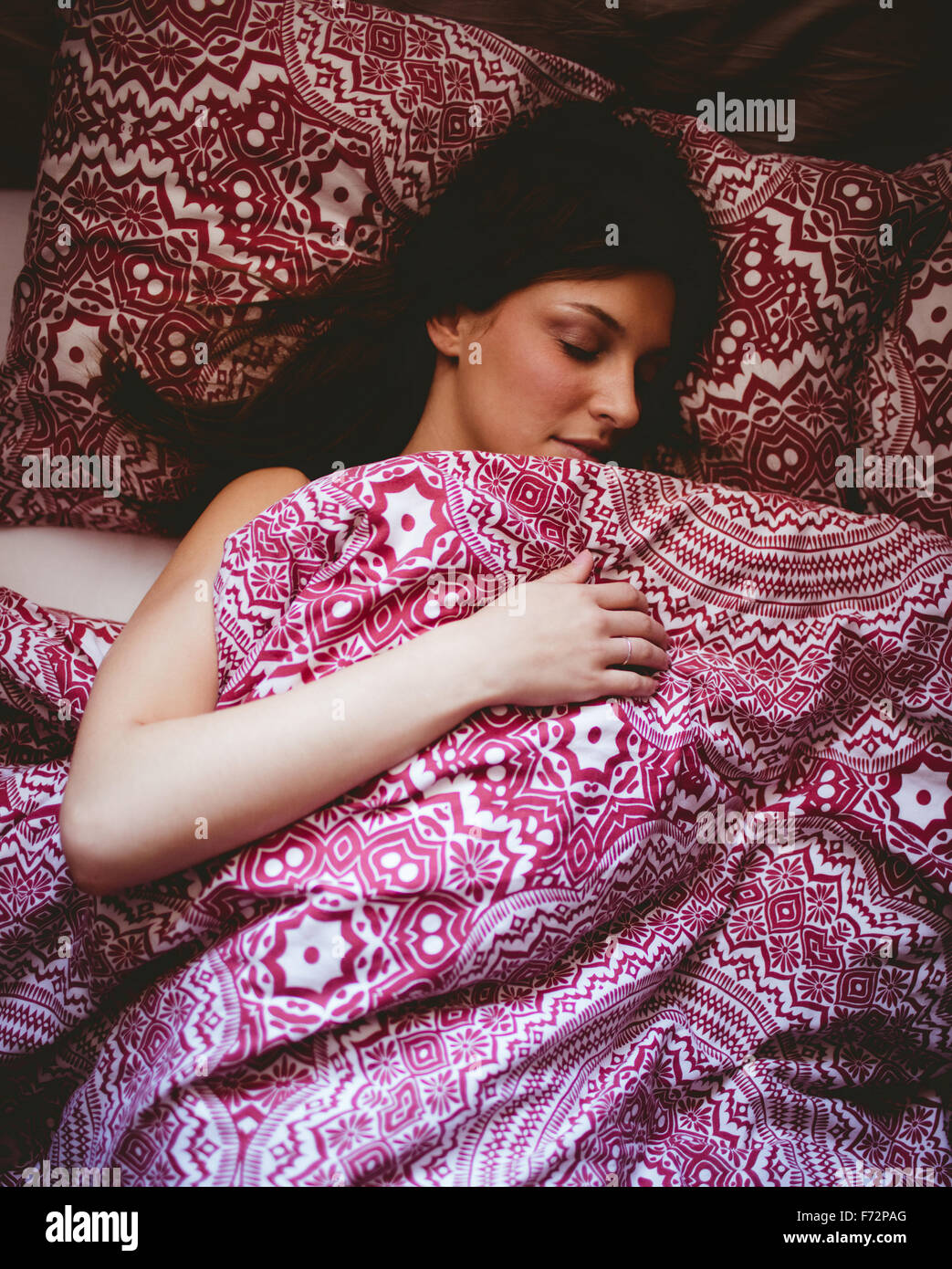 Young woman sleeping on bed Stock Photo Alamy