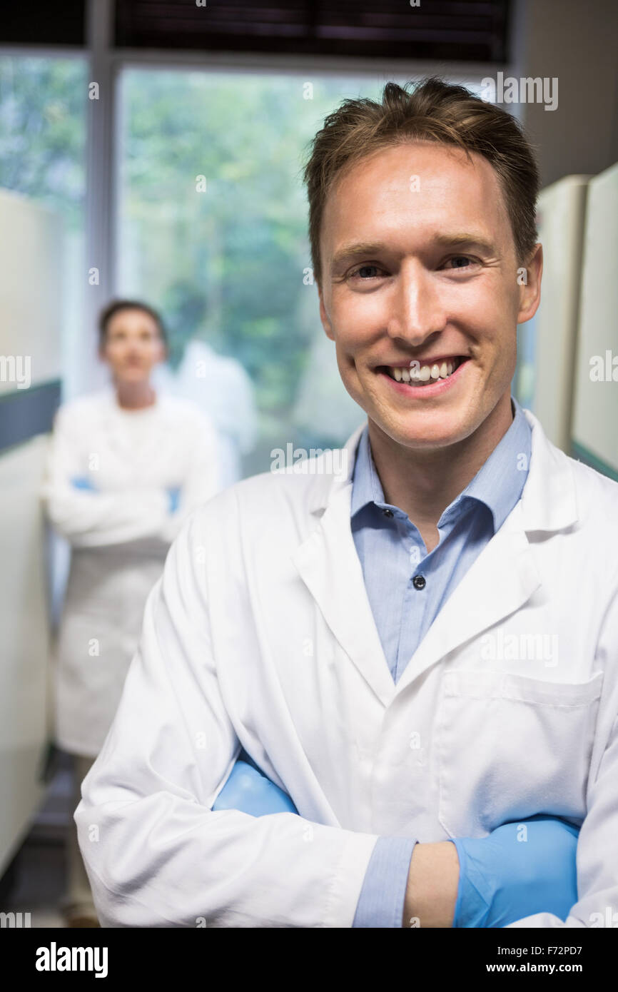 Two scientists smiling at camera Stock Photo