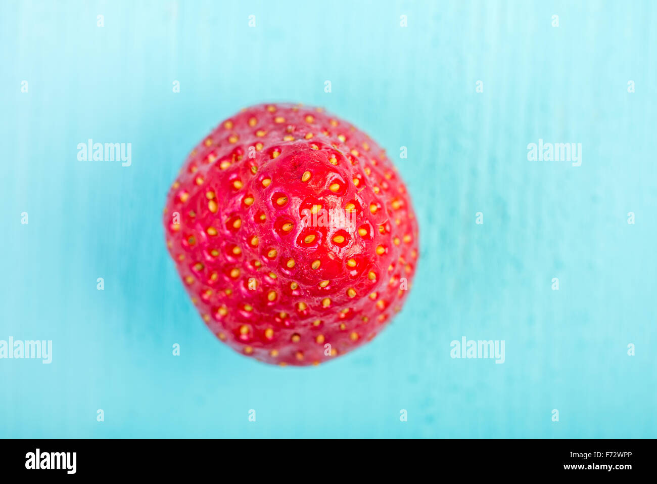 Fresh Red Strawberry On Blue Wood Boards Background Stock Photo - Alamy