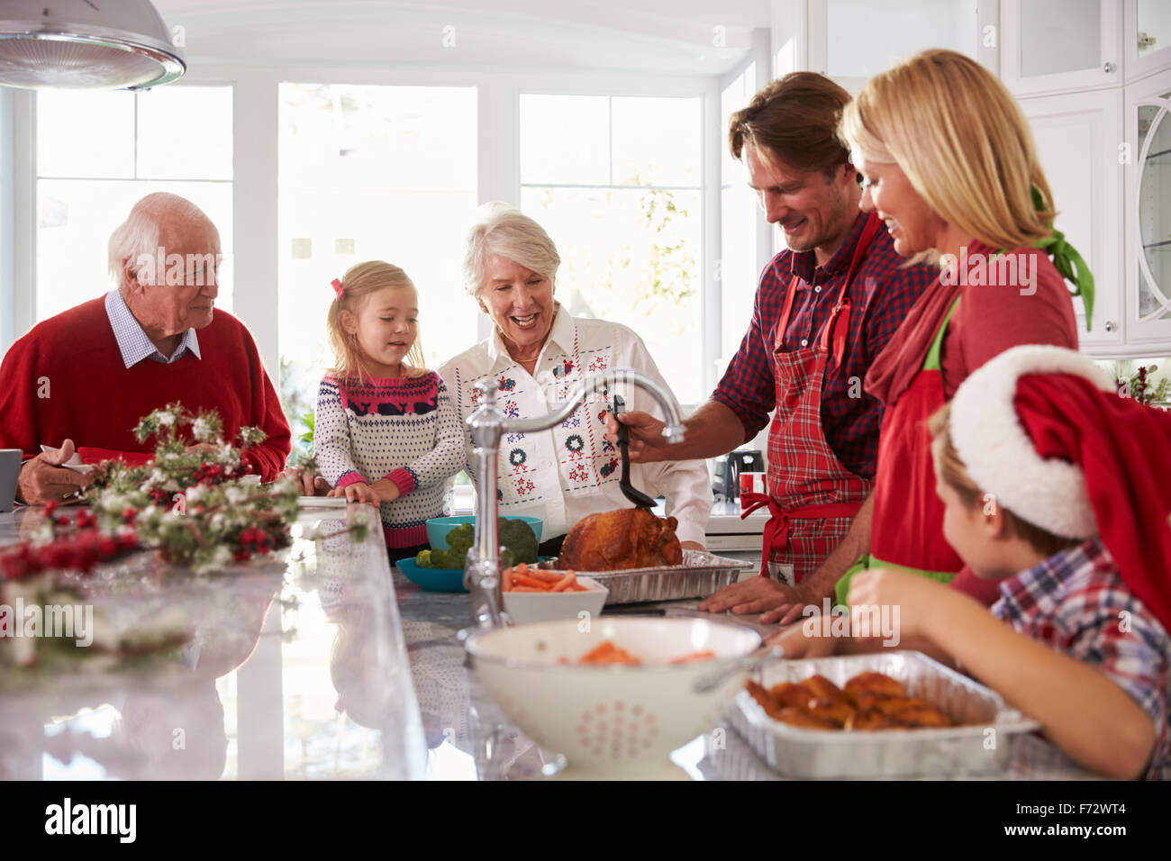 Grandfather basting turkey hi-res stock photography and images - Alamy