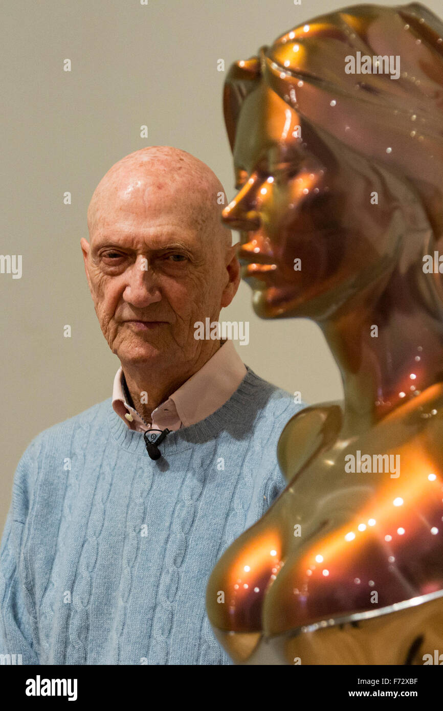 London, UK. 24 November 2015. Arist Allen Jones poses with his Kate Moss sculpture 'A Model Model', 2014-5.  Marlborough Fine Art present Colour Matters, an exhibition of new sculptural works by British artist Allen Jones. Jones first exhibited with Marlborough Fine Art in 1971, and this marks the fourth exhibition with the gallery. It runs from 25 November 2015 to 23 January 2016. Stock Photo