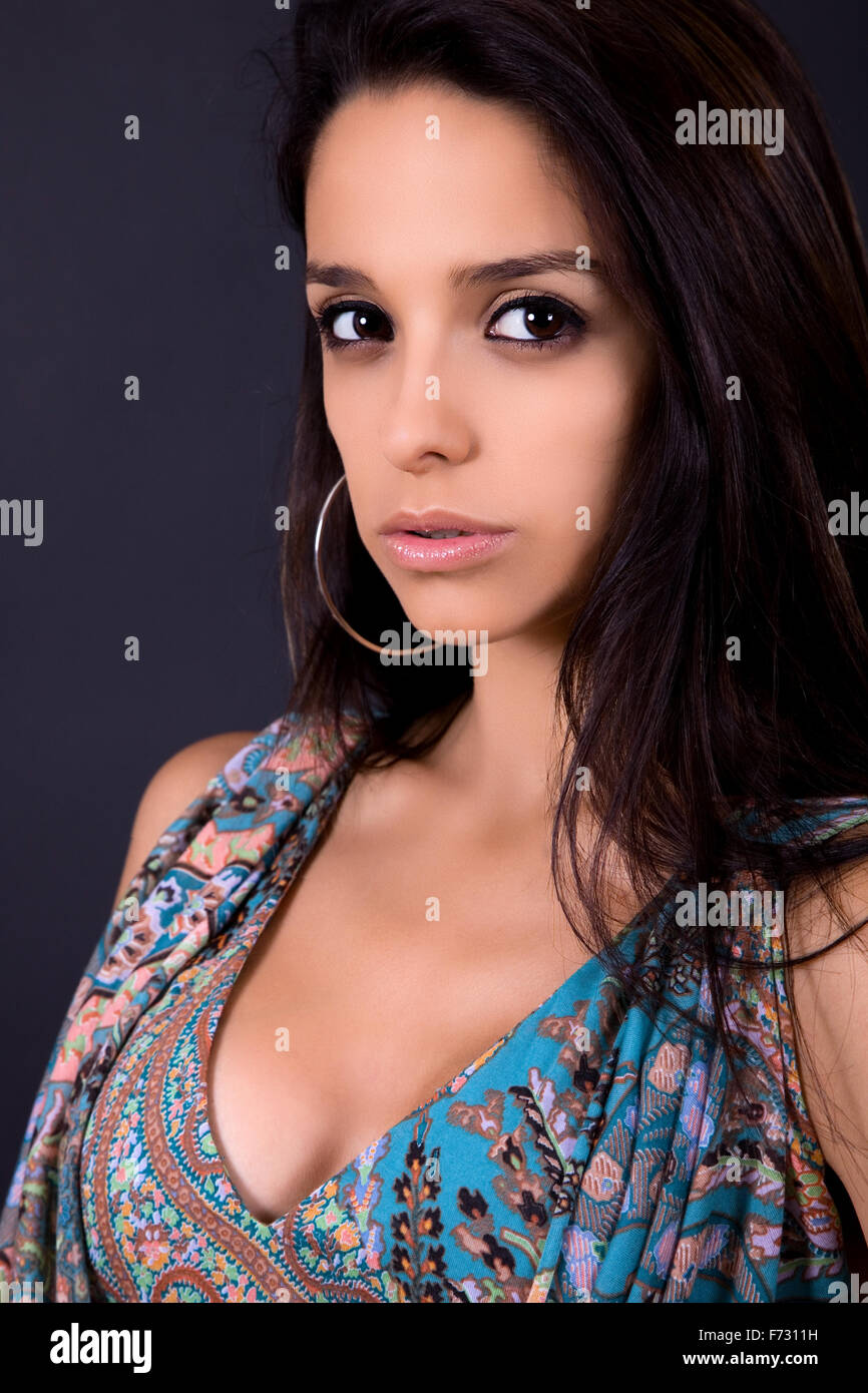 young beautiful woman portrait on a black background Stock Photo - Alamy