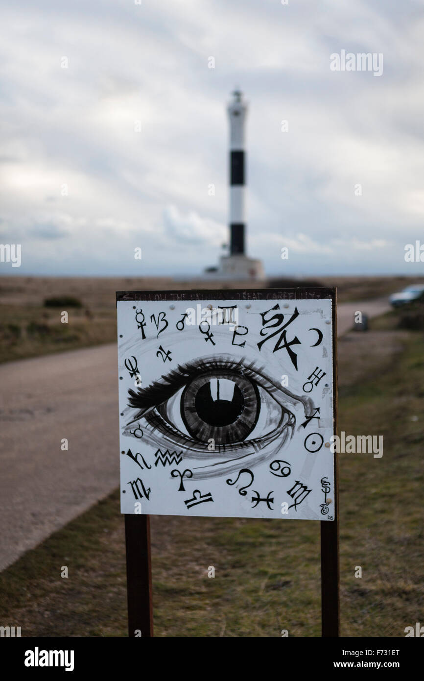 Esoteric new age shop sign in front of the lighthouse at Dungeness, Kent, England, UK Stock Photo